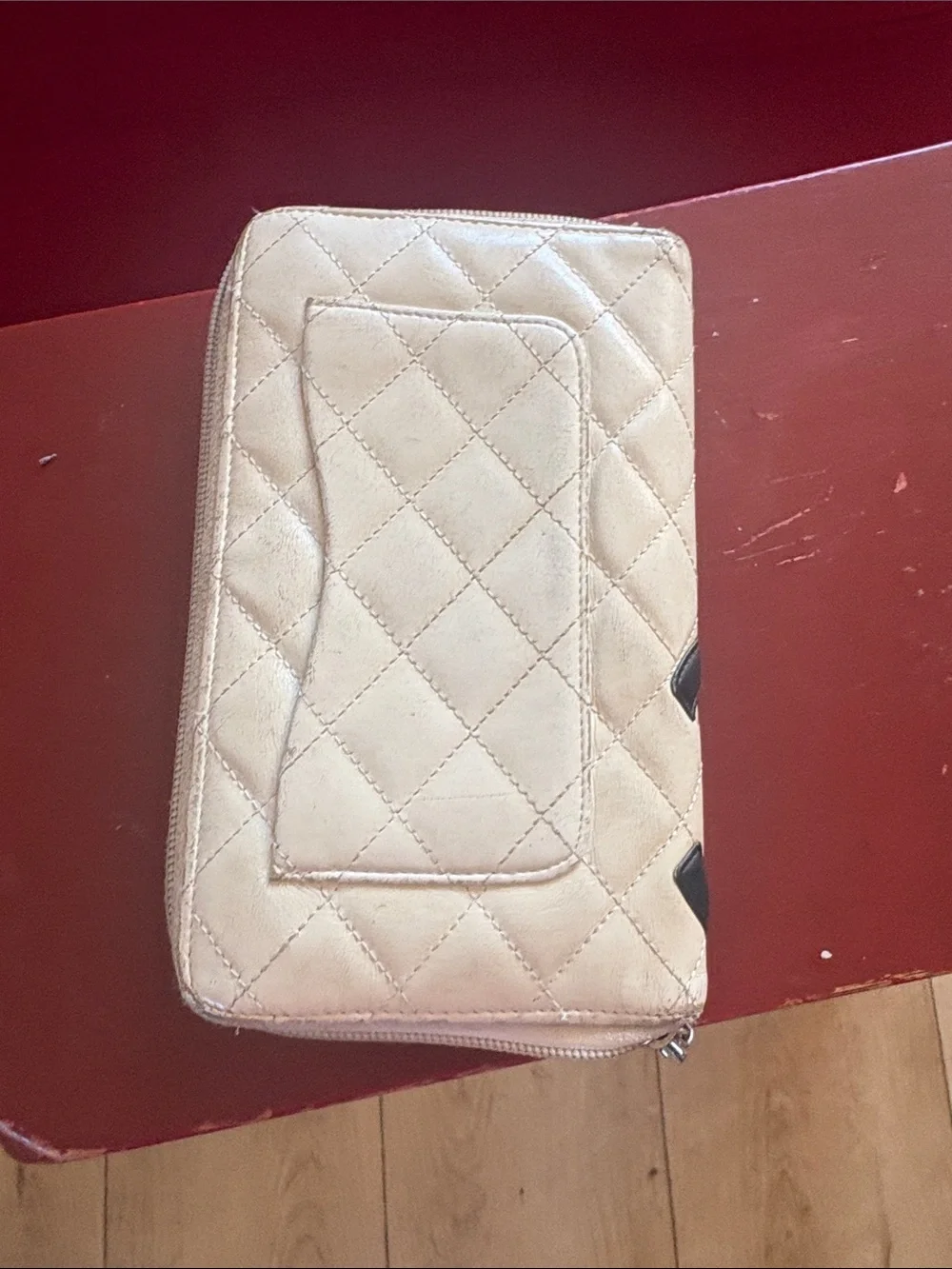 CHANEL Quilted Zip Wallet in Cream with Black CC